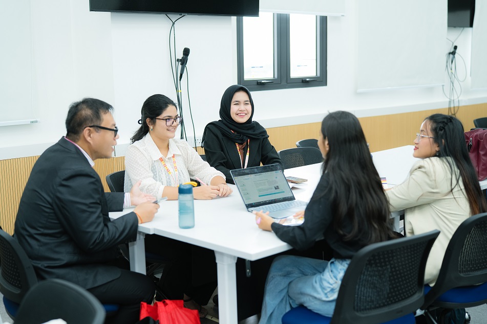 Team discussion around a meeting table